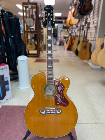 "PREVIOUSLY ROCKED" -Epiphone J-200 EC Studio Vintage Natural