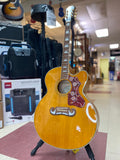 "PREVIOUSLY ROCKED" -Epiphone J-200 EC Studio Vintage Natural